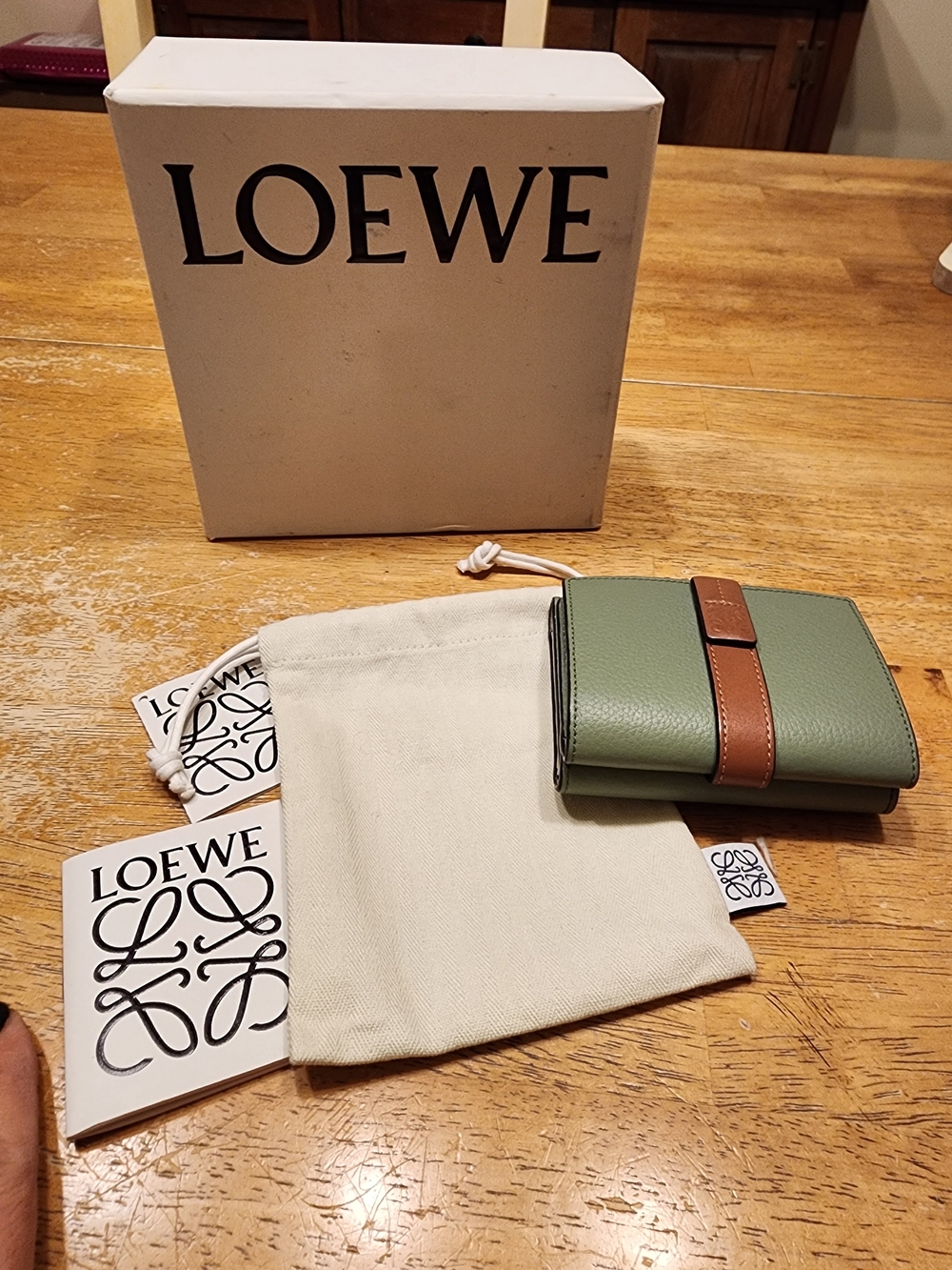 sage green and tan Loewe Anagram Trifold Wallet in soft grained calfskin